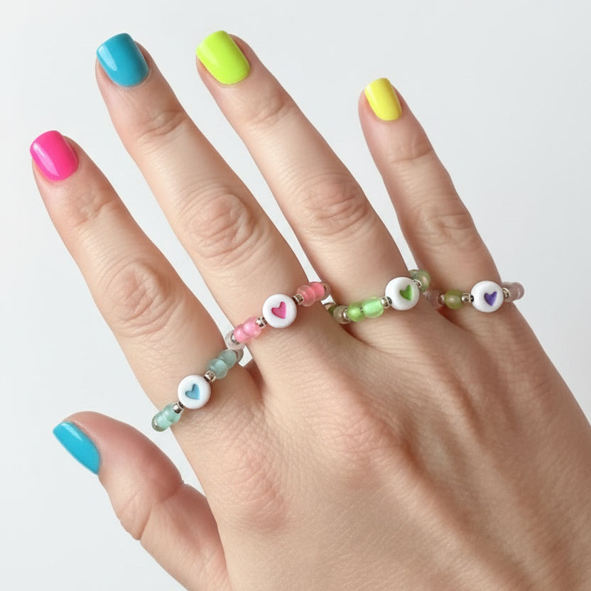 Love Life Adjustable Glow Heart Ring on hand