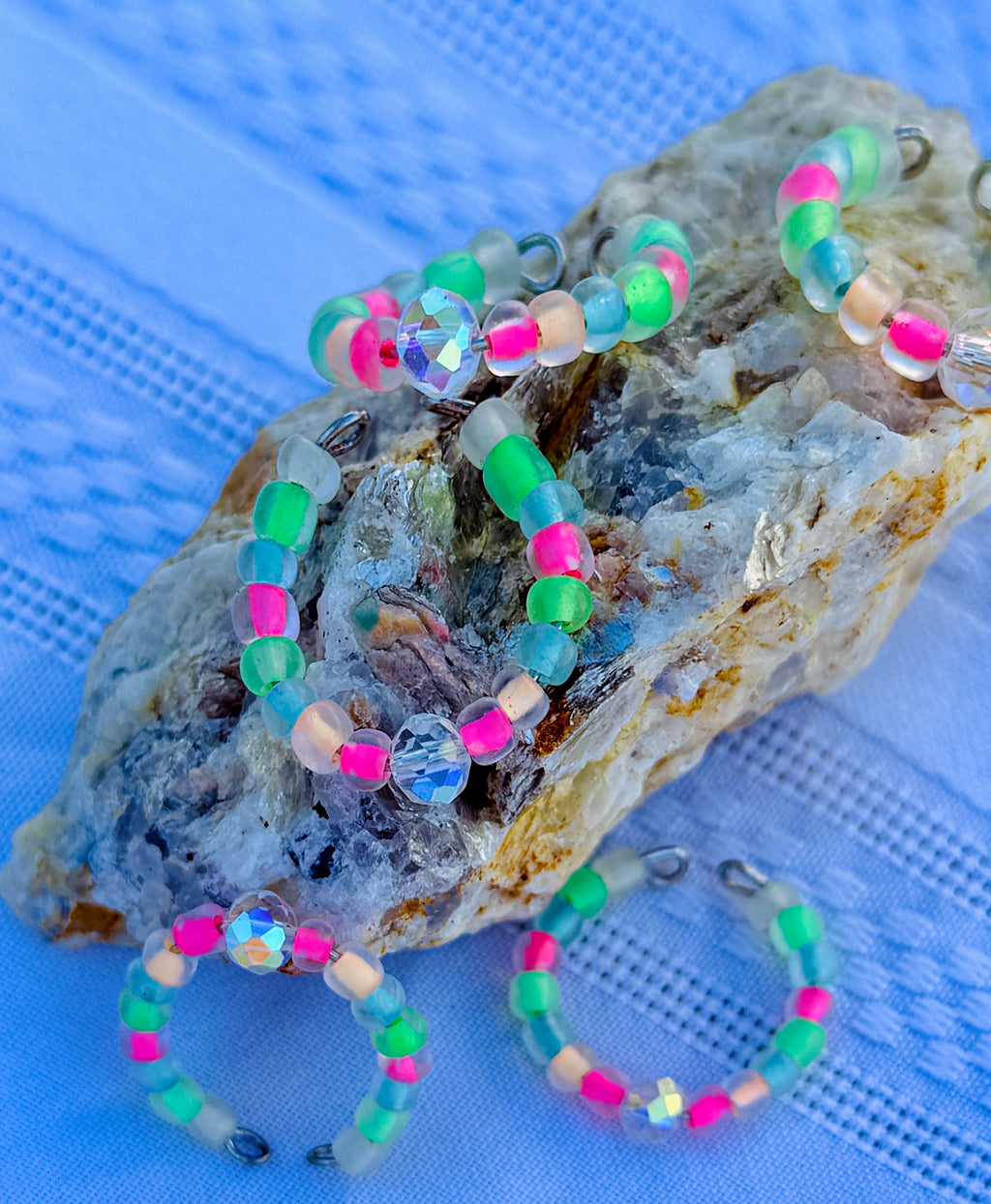 Princess Candy Ring close up on rock blue background