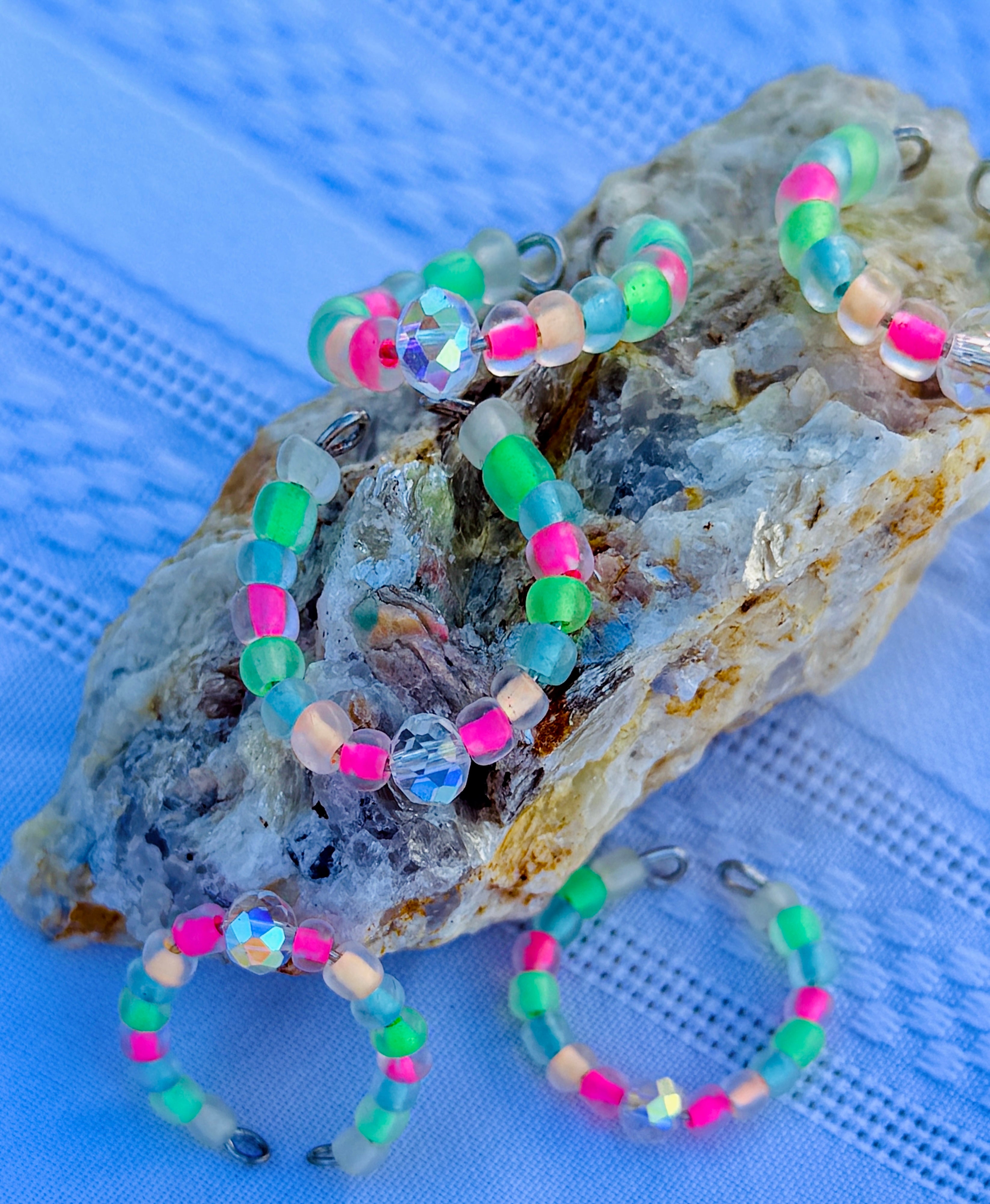 Princess Candy Ring close up on rock blue background