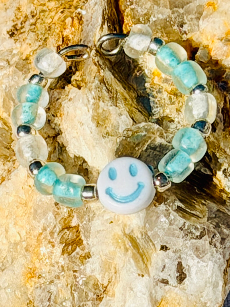 Do Stuff Adjustable Glow Smiley Ring