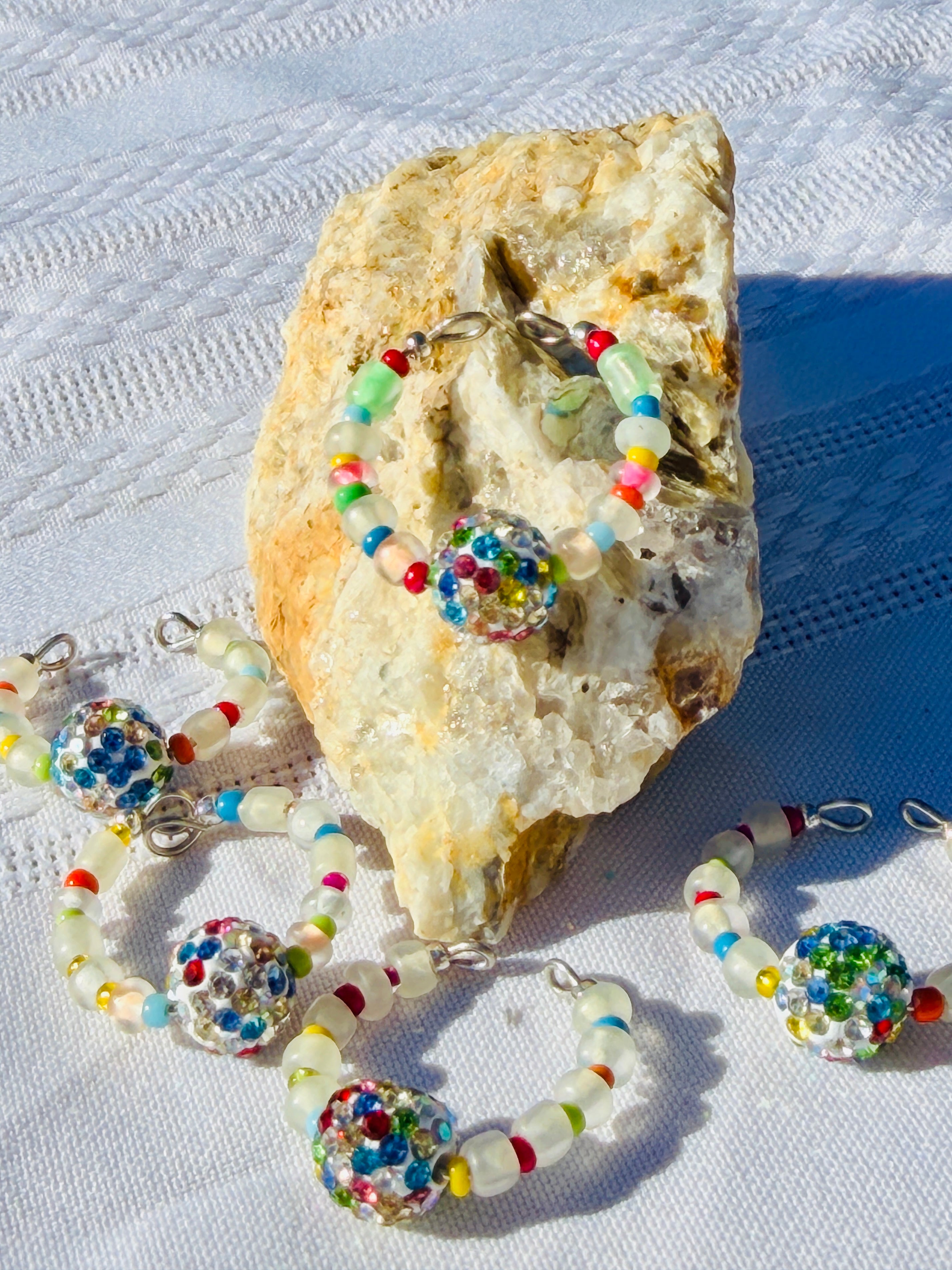 Disco Daydream Ring group shot with disco ball center bead