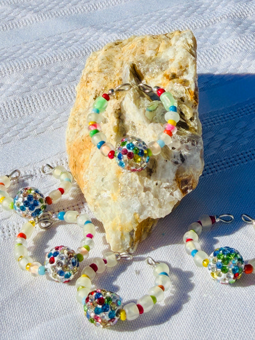 Disco Daydream Ring group shot with disco ball center bead