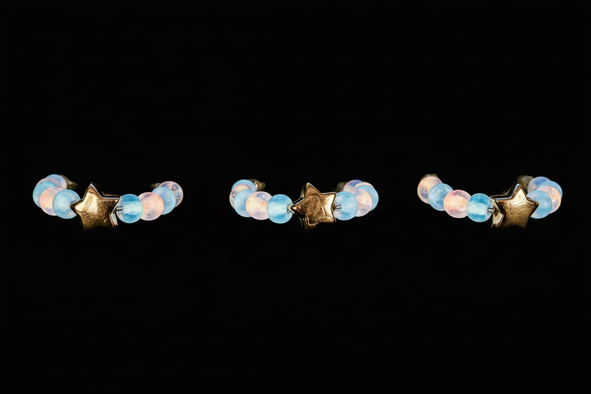 Gold Star Ring glowing in the dark row of five